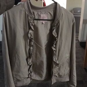 A tan bomber jacket